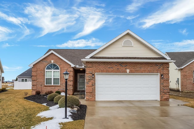 ranch-style house featuring driveway, brick siding, a shingled roof, an attached garage, and a front yard