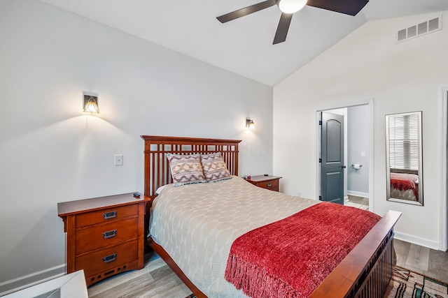 bedroom with lofted ceiling, visible vents, ceiling fan, light wood-type flooring, and baseboards