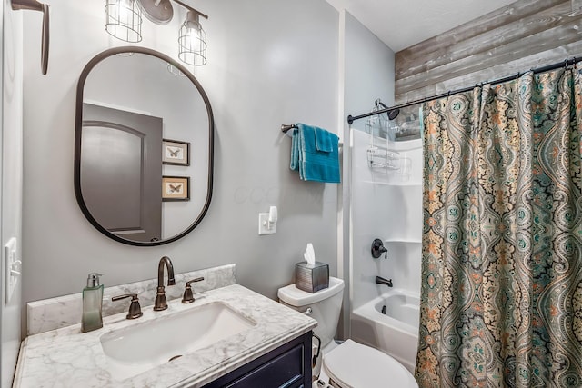 bathroom featuring shower / bath combination with curtain, vanity, and toilet