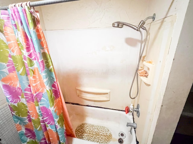 full bath featuring shower / bath combination with curtain