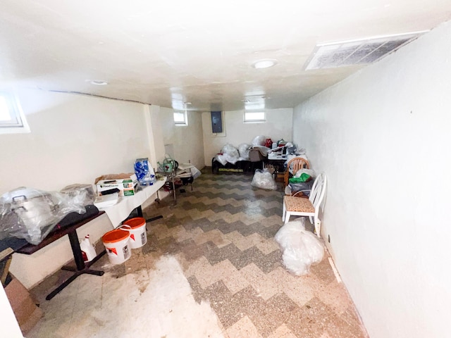 basement featuring tile patterned floors