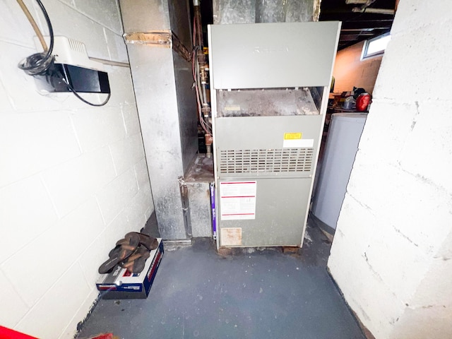 utility room with heating unit