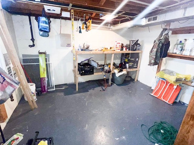 unfinished basement with visible vents