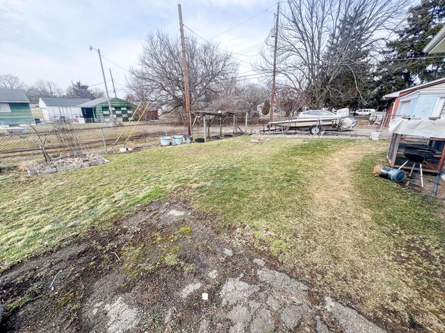 view of yard with fence