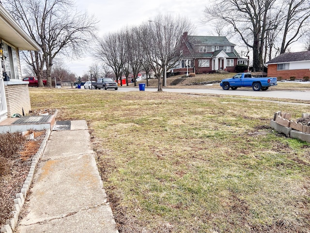 view of yard featuring a residential view