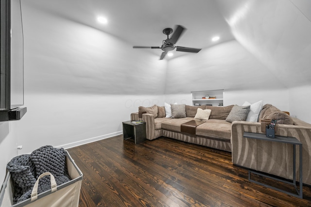 living area with dark wood finished floors, lofted ceiling, recessed lighting, ceiling fan, and baseboards