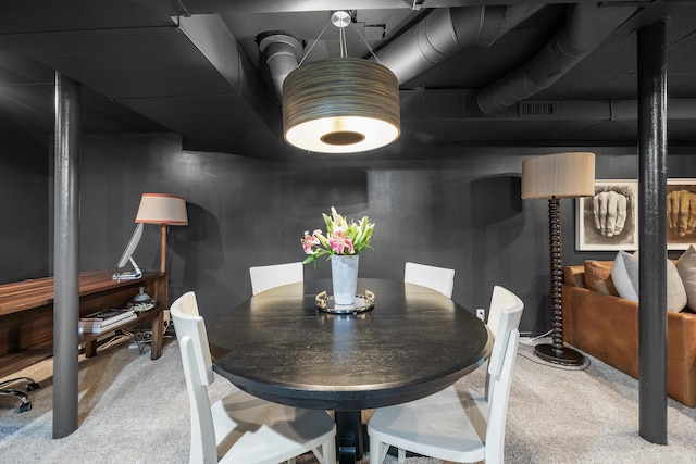 view of carpeted dining space