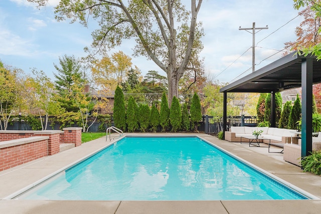 view of swimming pool featuring a fenced backyard, an outdoor hangout area, and a fenced in pool