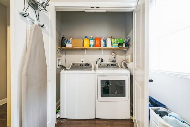 laundry area featuring laundry area, dark wood-style flooring, and independent washer and dryer