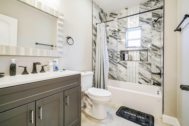 bathroom with toilet, shower / bath combo, and vanity