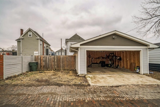 garage with fence