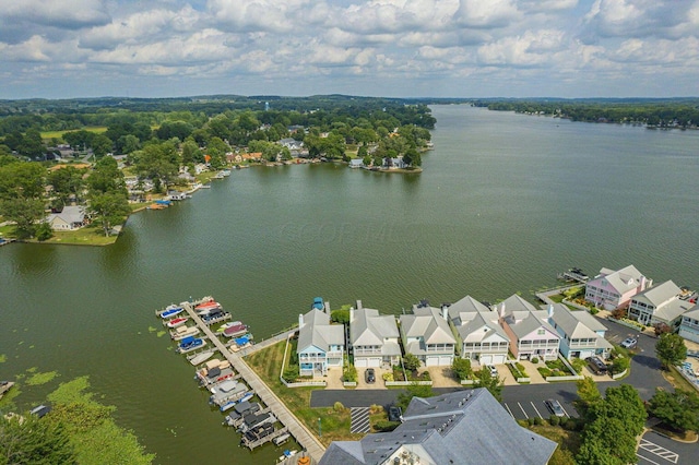 birds eye view of property featuring a residential view and a water view