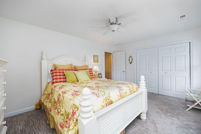 bedroom with carpet, a closet, visible vents, a ceiling fan, and baseboards