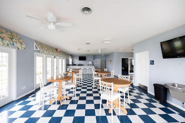 dining area with visible vents, plenty of natural light, baseboards, and tile patterned floors