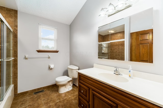 bathroom featuring baseboards, visible vents, toilet, a textured ceiling, and vanity