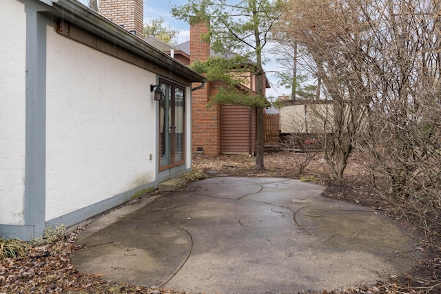 view of patio featuring french doors