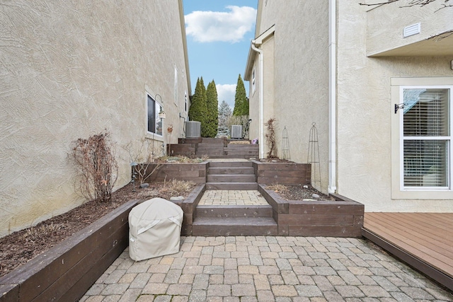 view of patio / terrace with central AC unit