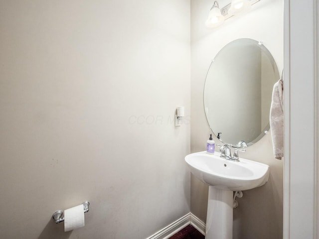 bathroom featuring baseboards