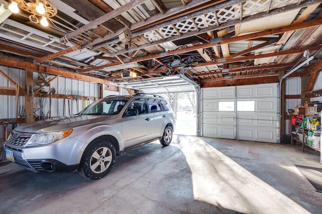 garage featuring a garage door opener