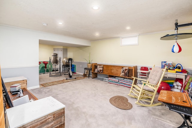 interior space with carpet, a textured ceiling, baseboards, and recessed lighting