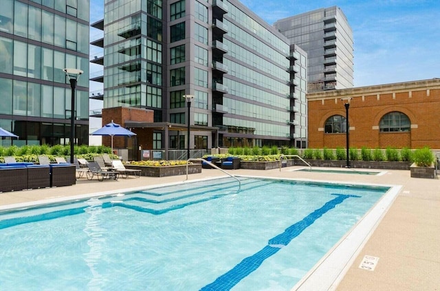 community pool with a patio