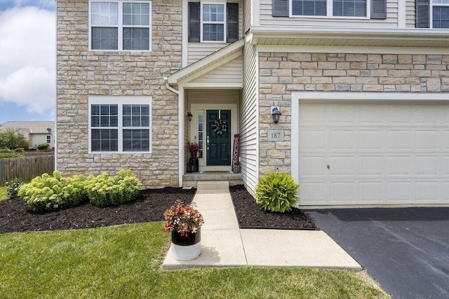 property entrance with a garage