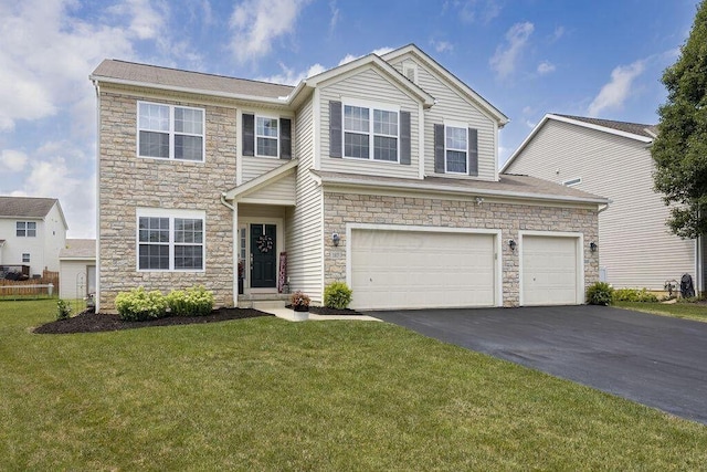 view of front of property with driveway, stone siding, and a front yard