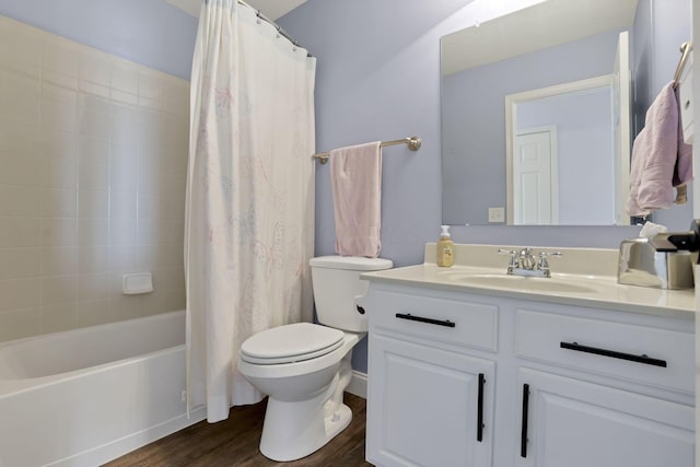 full bath with shower / bathtub combination with curtain, vanity, toilet, and wood finished floors