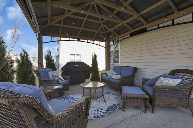 view of patio / terrace featuring a gazebo, outdoor lounge area, and area for grilling