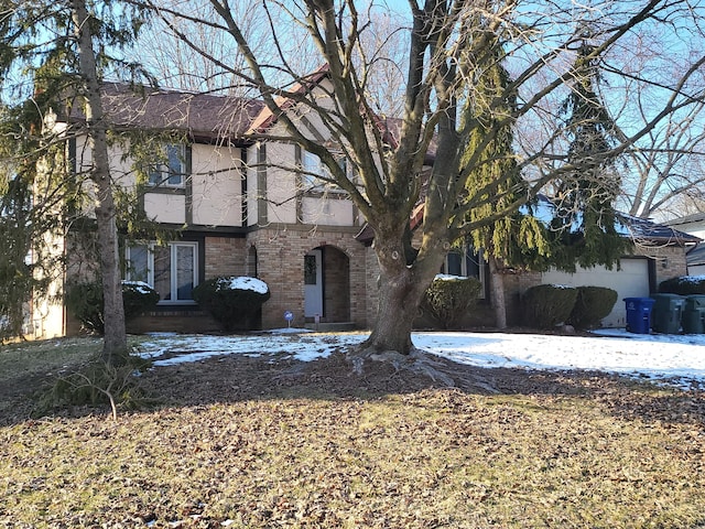 view of front of property featuring brick siding