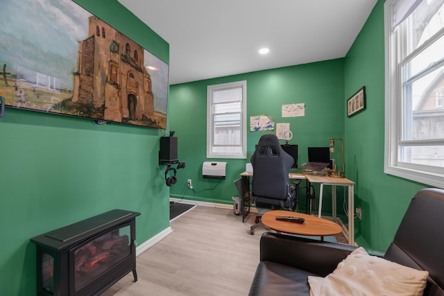 office area with recessed lighting, baseboards, and wood finished floors