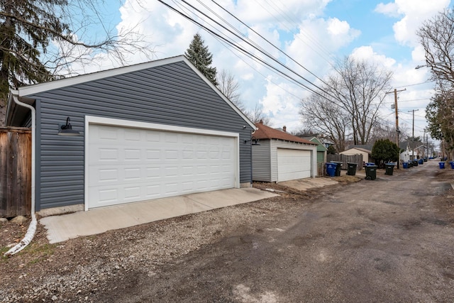 garage featuring fence