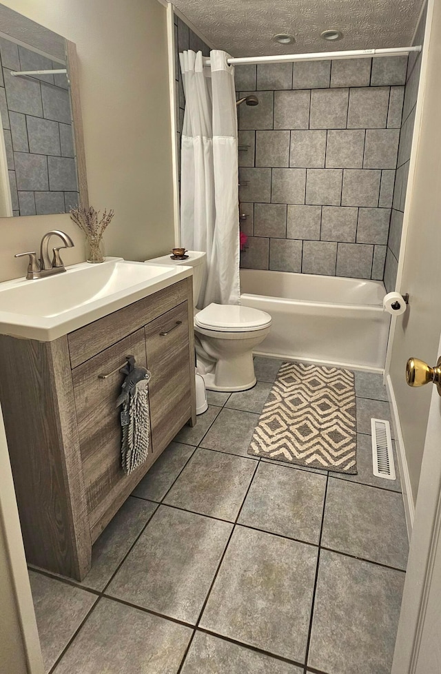 bathroom with vanity, shower / bathtub combination with curtain, visible vents, tile patterned flooring, and toilet