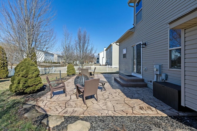 view of patio / terrace with entry steps, fence, and outdoor dining area