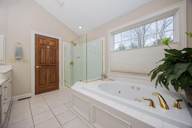 full bathroom featuring visible vents, a shower stall, lofted ceiling, tile patterned floors, and vanity
