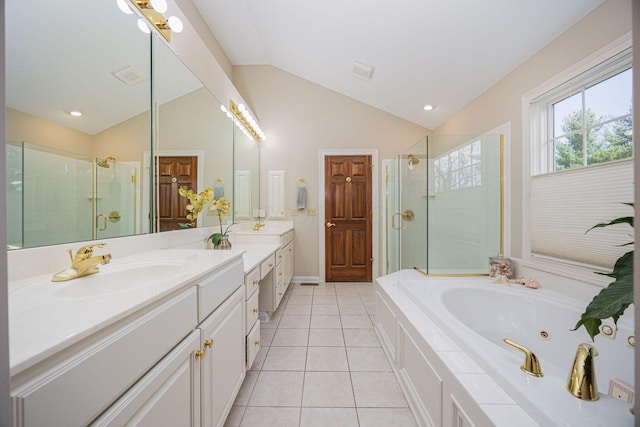 full bath featuring tile patterned flooring, visible vents, vaulted ceiling, a stall shower, and a sink