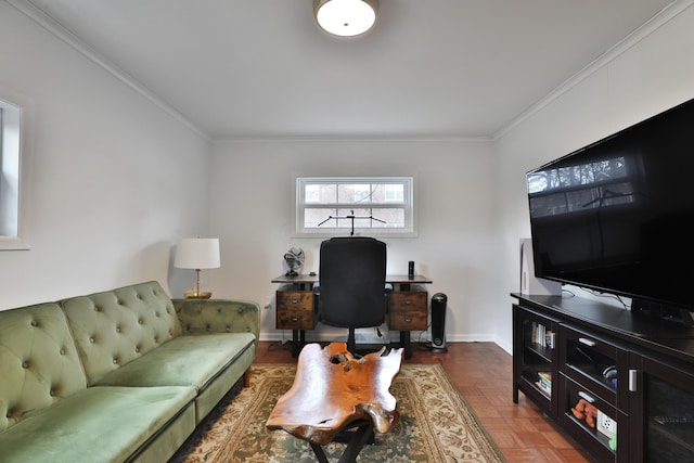 living area featuring crown molding and baseboards