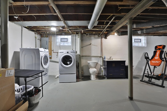 basement with washer and clothes dryer