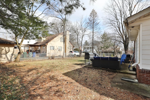 view of yard featuring an outdoor hangout area and fence