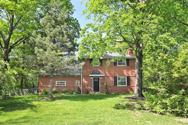 2938 Sherwood Rd, Columbus, OH 43209 - view of front facade featuring brick siding and a chimney