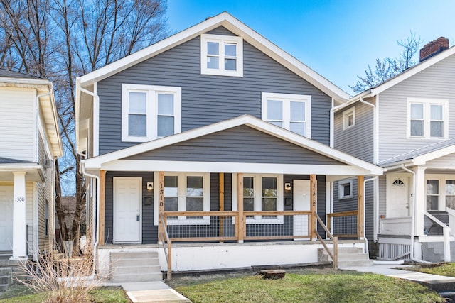 traditional style home with covered porch