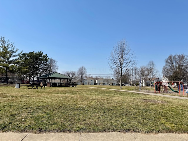 view of home's community with a gazebo, a lawn, and playground community