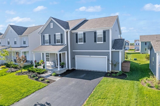 7181 Fenwick St NW, Pickerington, OH 43147 - view of front of home featuring a shingled roof, a garage, board and batten siding, asphalt driveway, and covered porch