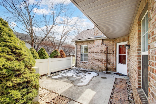 view of patio / terrace featuring fence