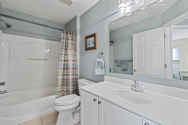 full bathroom with visible vents, shower / bathtub combination with curtain, toilet, vanity, and tile patterned floors