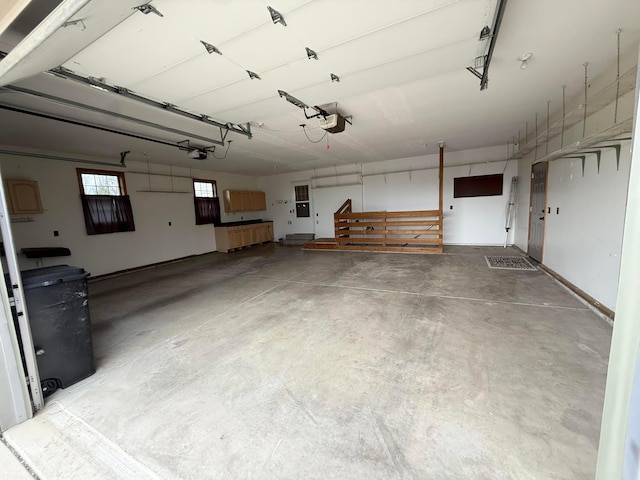 garage featuring a garage door opener