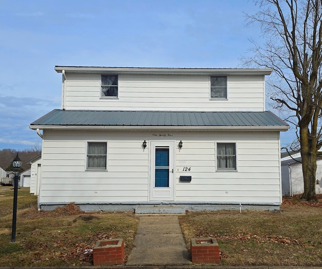 view of front of property featuring metal roof