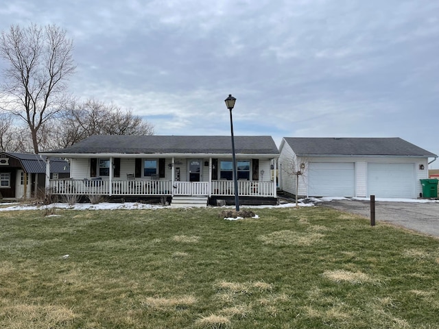 ranch-style house with a garage, a porch, and a front lawn