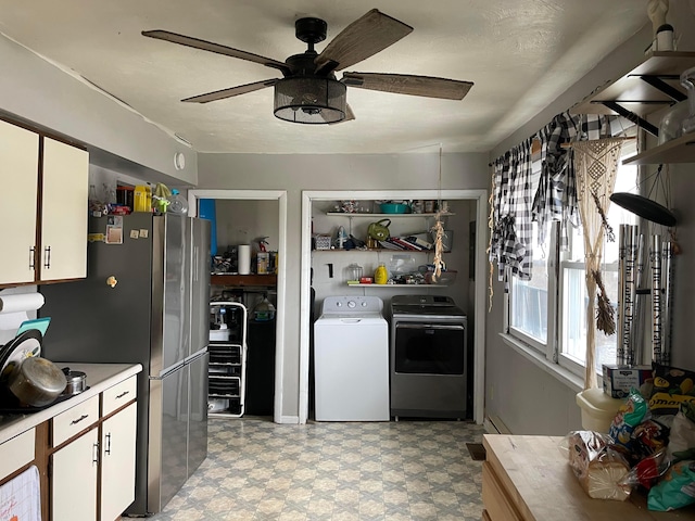 kitchen featuring white cabinets, light countertops, light floors, and open shelves