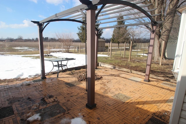 view of patio with fence and a pergola